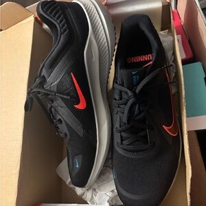 Nike Black Running Sneakers with Red Swoosh